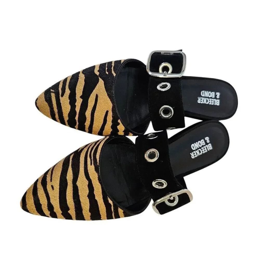 Bleecker & Bond animal print mules with a top strap. Size 6.5.